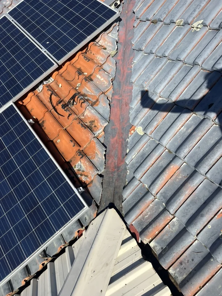 Clean roof valley after debris removal
